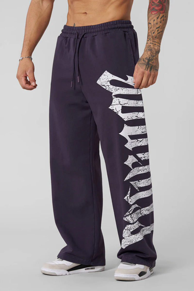 Men's wide sweatpants made of brushed fleece with side vintage print and drawstring waistband Hudson & Parker