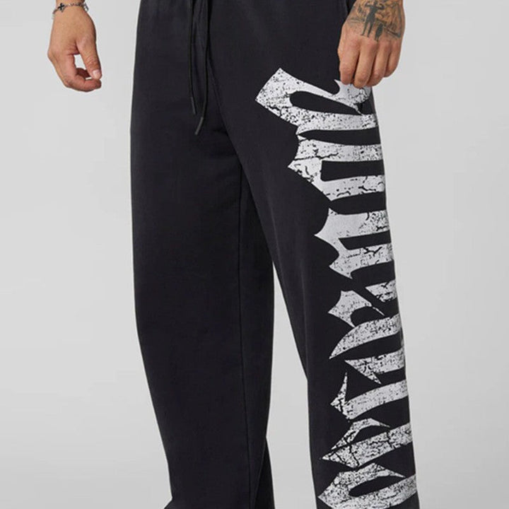 Men's wide sweatpants made of brushed fleece with side vintage print and drawstring waistband Hudson & Parker