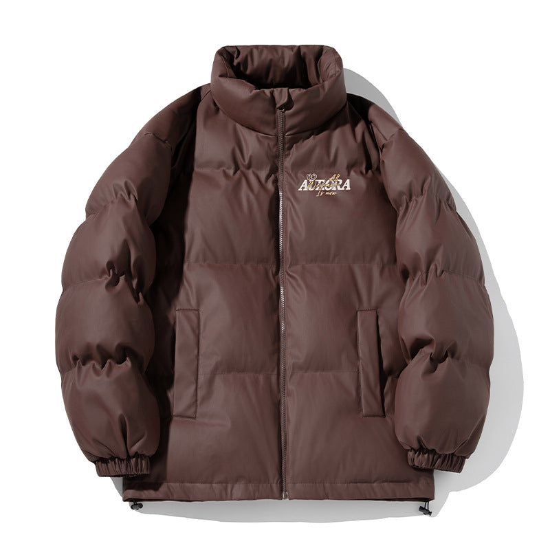 Unisex Insulated Puffer Jacket in minimalist boxy cut with high stand-up collar, concealed zipper, and drawstring hem Hudson & Parker