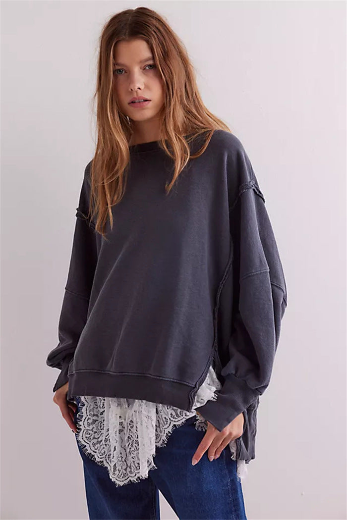 Women's oversized sweatshirt with balloon sleeves, open seam stitches, and side slits Hudson & Parker