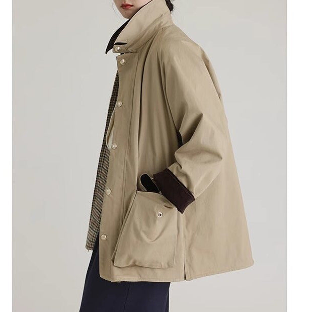 Men's short field coat with cord collar, snap button placket and patch pockets.