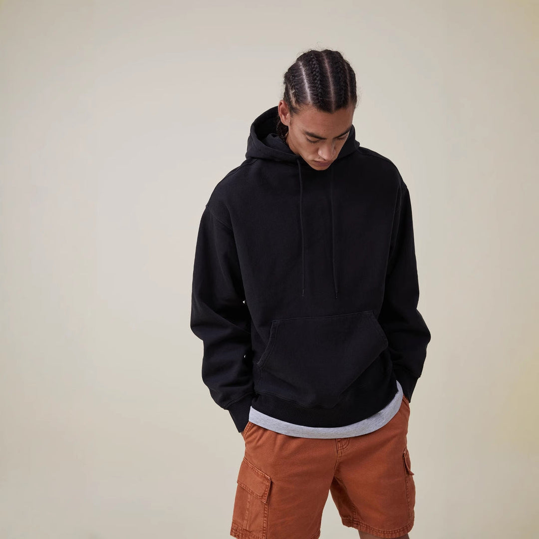 Women’s oversized hoodie dress with kangaroo pocket, extended silhouette and soft French terry Hudson & Parker Fashion
