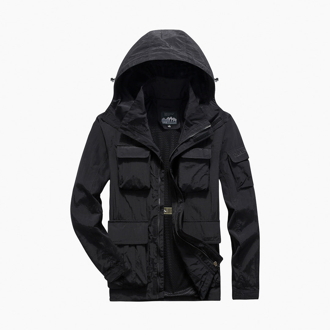 Men's multifunctional utility field jacket with numerous flap and zippered pockets as well as D-ring Hudson & Parker
