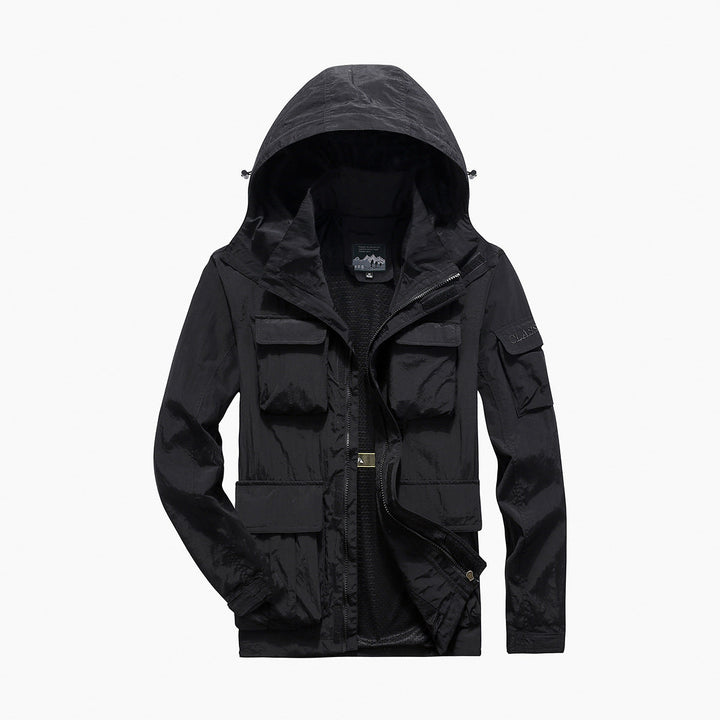Men's multifunctional utility field jacket with numerous flap and zippered pockets as well as D-ring Hudson & Parker