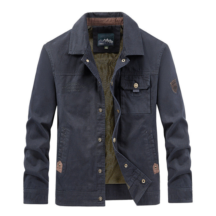 Men's lightweight canvas field jacket with chest flap, breathable mesh lining, and multiple pockets.
