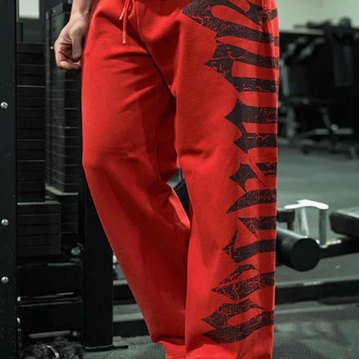 Men's wide sweatpants made of brushed fleece with side vintage print and drawstring waistband Hudson & Parker