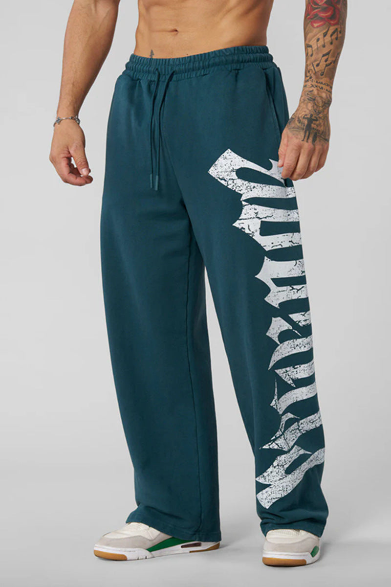 Men's wide sweatpants made of brushed fleece with side vintage print and drawstring waistband Hudson & Parker