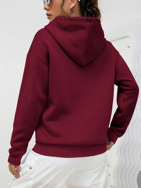 Women’s oversized hoodie dress with kangaroo pocket, extended silhouette and soft French terry Hudson & Parker Fashion