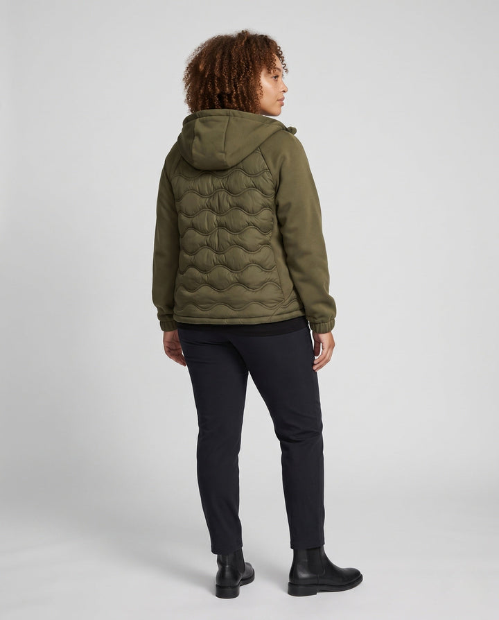 Women's quilted hybrid hoodie jacket with fleece sleeves, elastic cuffs, and wave quilting