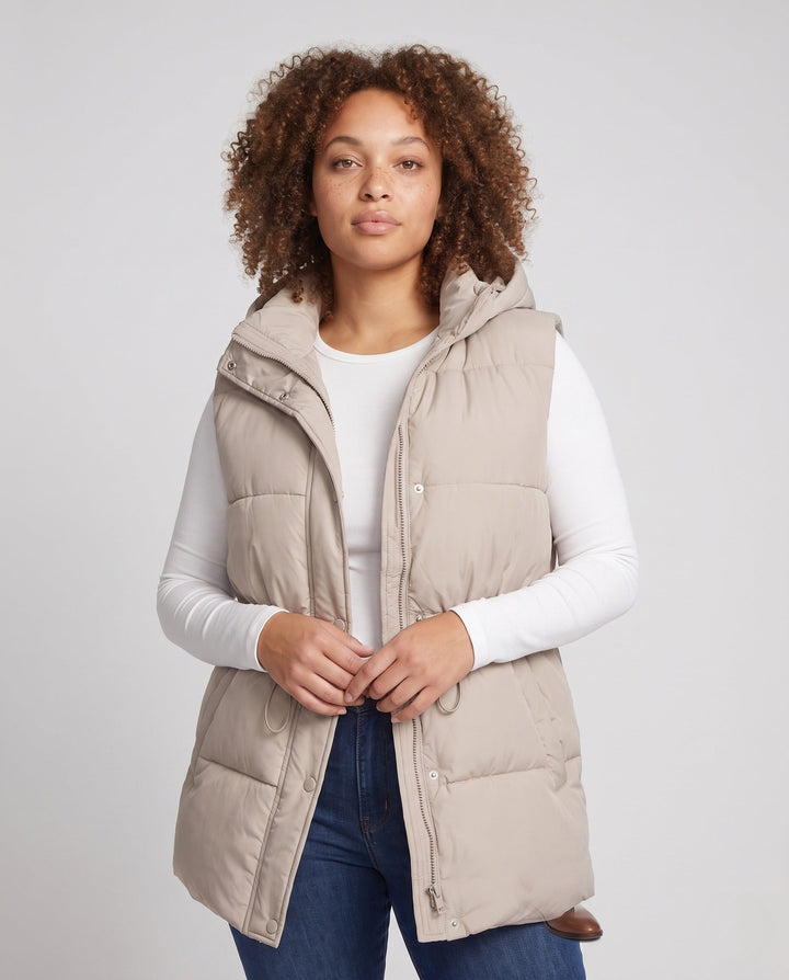 Women’s padded hooded vest with waistbelt and high collar