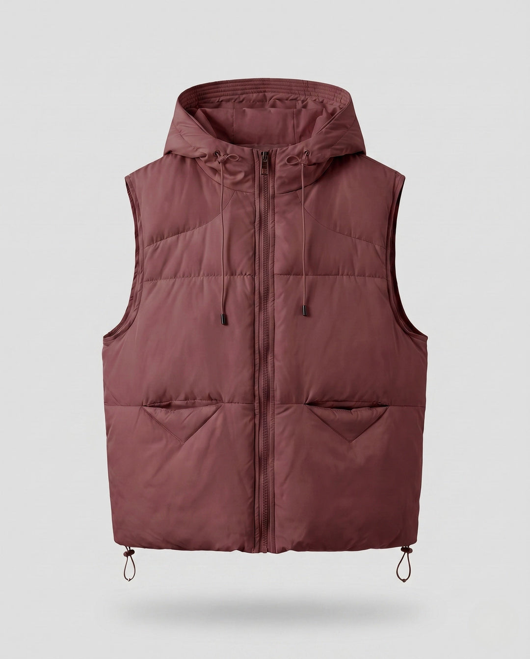 Women's padded hooded vest with thermal lining, adjustable hood and slanted pockets
