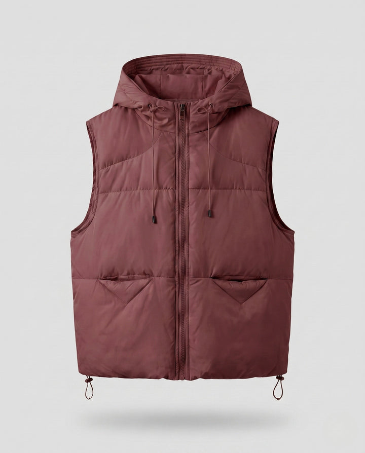 Women's padded hooded vest with thermal lining, adjustable hood and slanted pockets