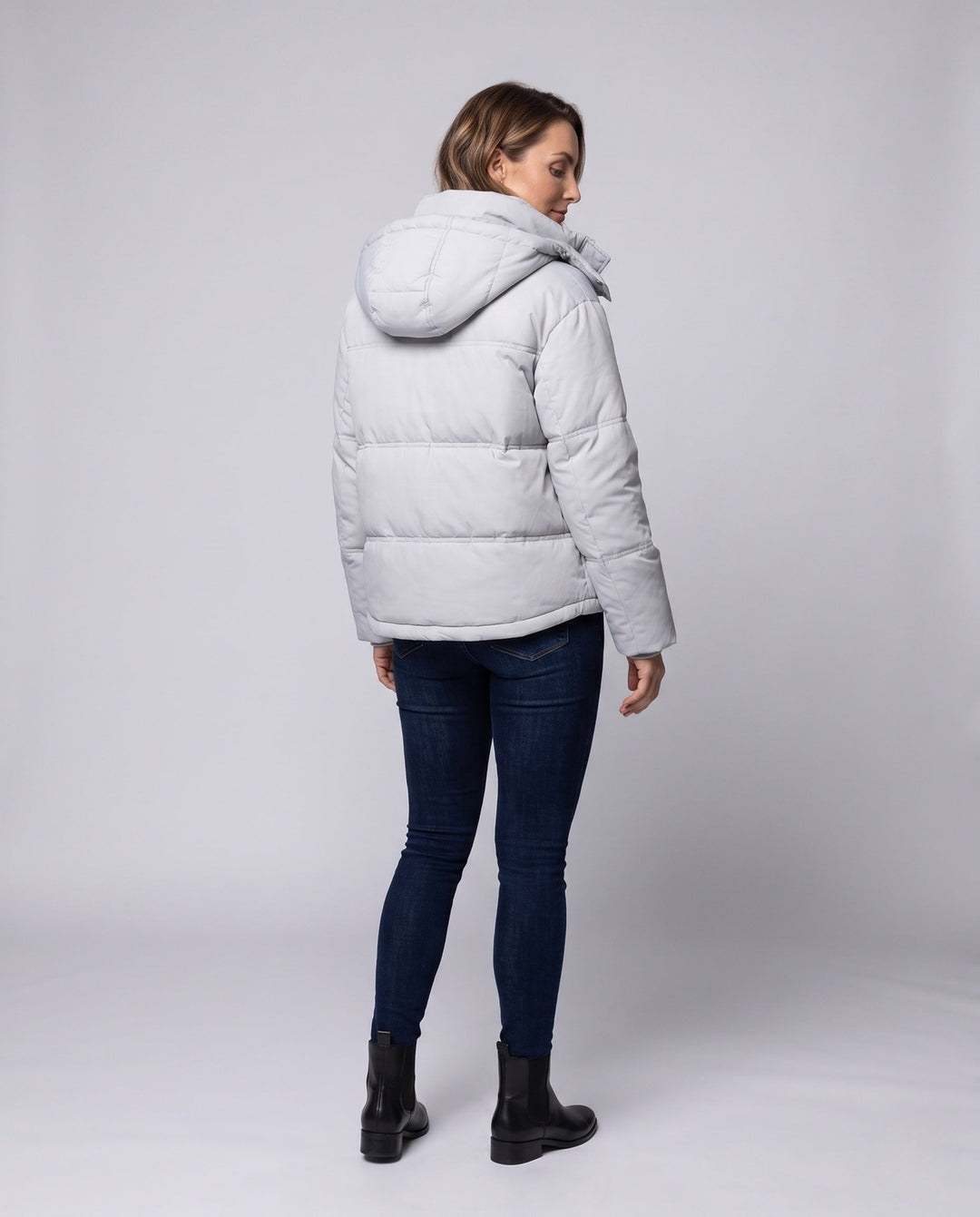 Women's short quilted hooded blouse with teddy inner collar, concealed two-way zipper, and adjustable hem