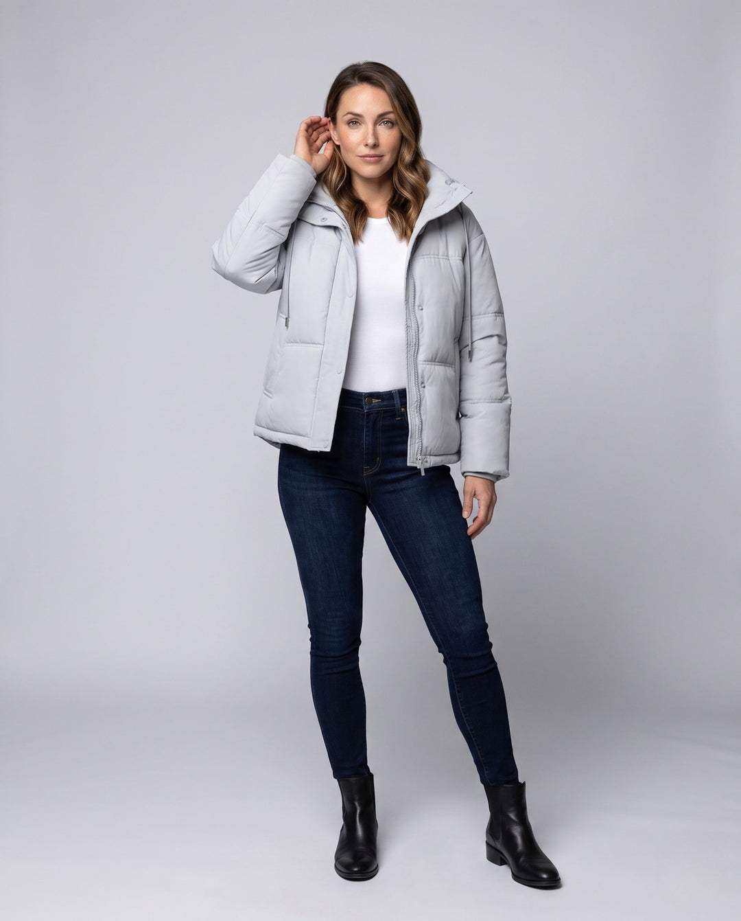 Women's short quilted hooded blouse with teddy inner collar, concealed two-way zipper, and adjustable hem