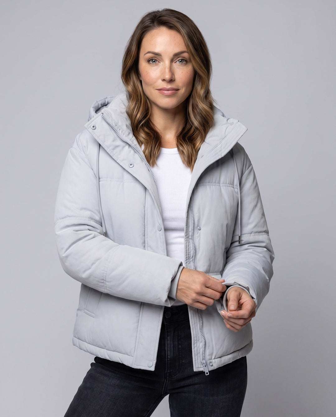 Women's short quilted hooded blouse with teddy inner collar, concealed two-way zipper, and adjustable hem