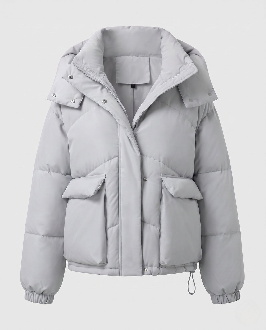 Ladies' short padded hooded puffer with oversized hood, flap pockets, and adjustable hem