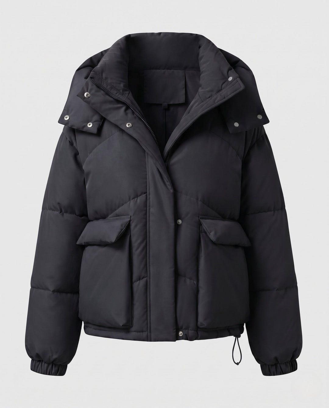 Ladies' short padded hooded puffer with oversized hood, flap pockets, and adjustable hem