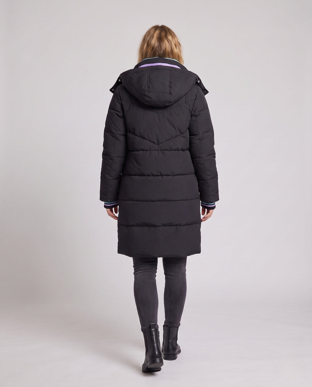 Women's longer padded hooded coat with large flap and patch pocket as well as elastic cuffs
