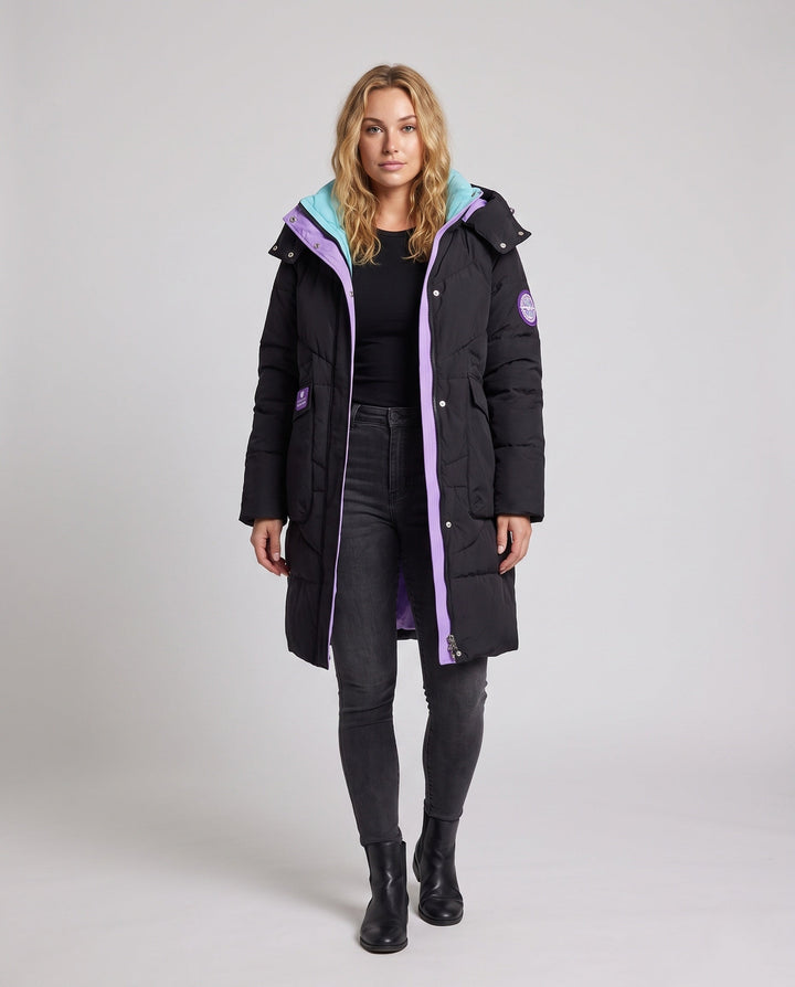 Women's longer padded hooded coat with large flap and patch pocket as well as elastic cuffs