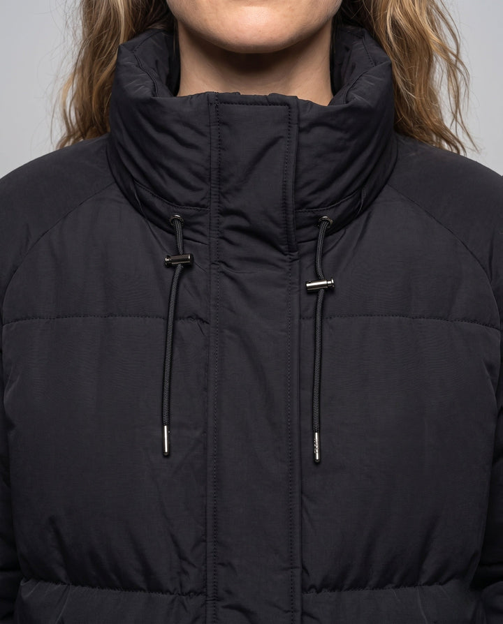Unisex oversized quilted jacket with contrast stripes on sleeves, high-closing collar, and hood placket