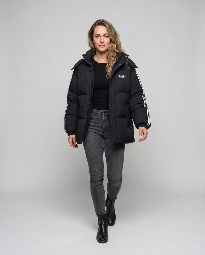 Unisex oversized quilted jacket with contrast stripes on sleeves, high-closing collar, and hood placket