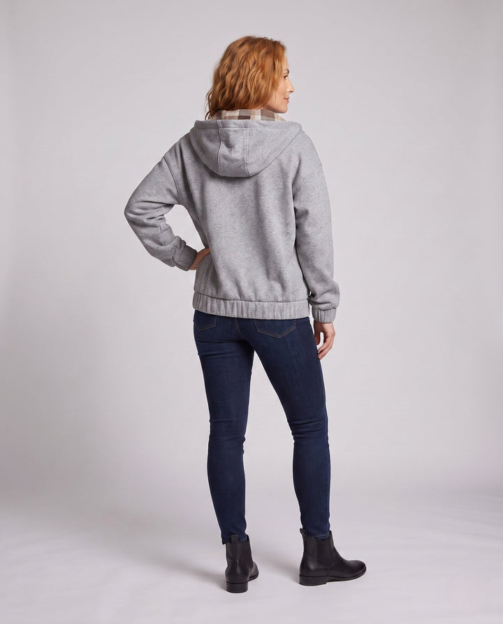 Women's oversized hoodie jacket with checked hood lining, elastic hem, and concealed side pockets