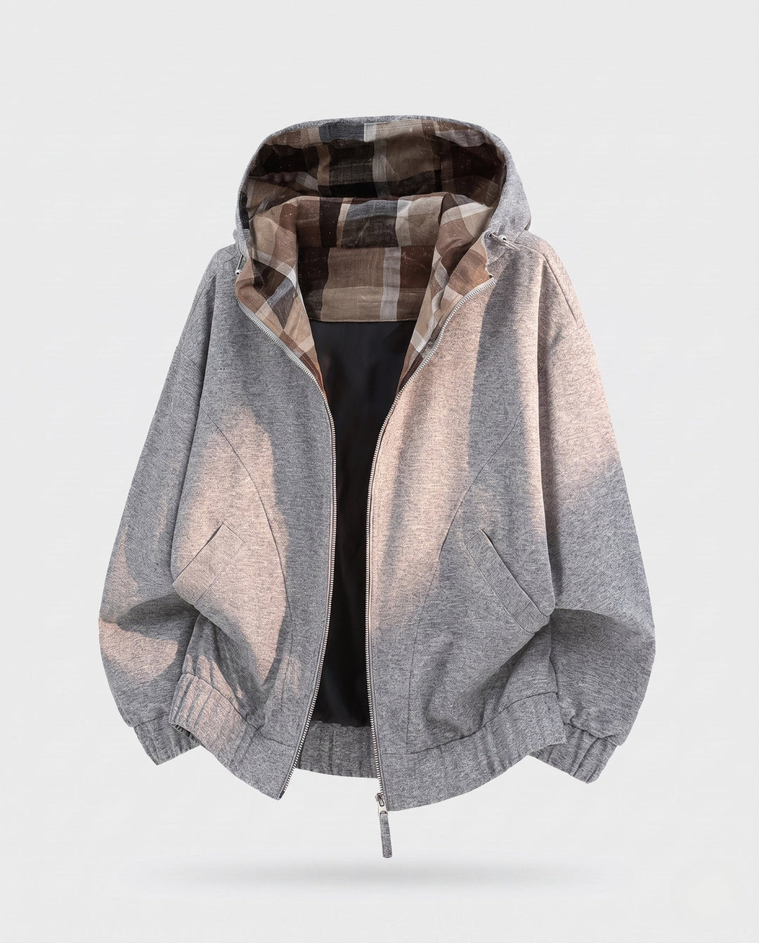 Women's oversized hoodie jacket with checked hood lining, elastic hem, and concealed side pockets