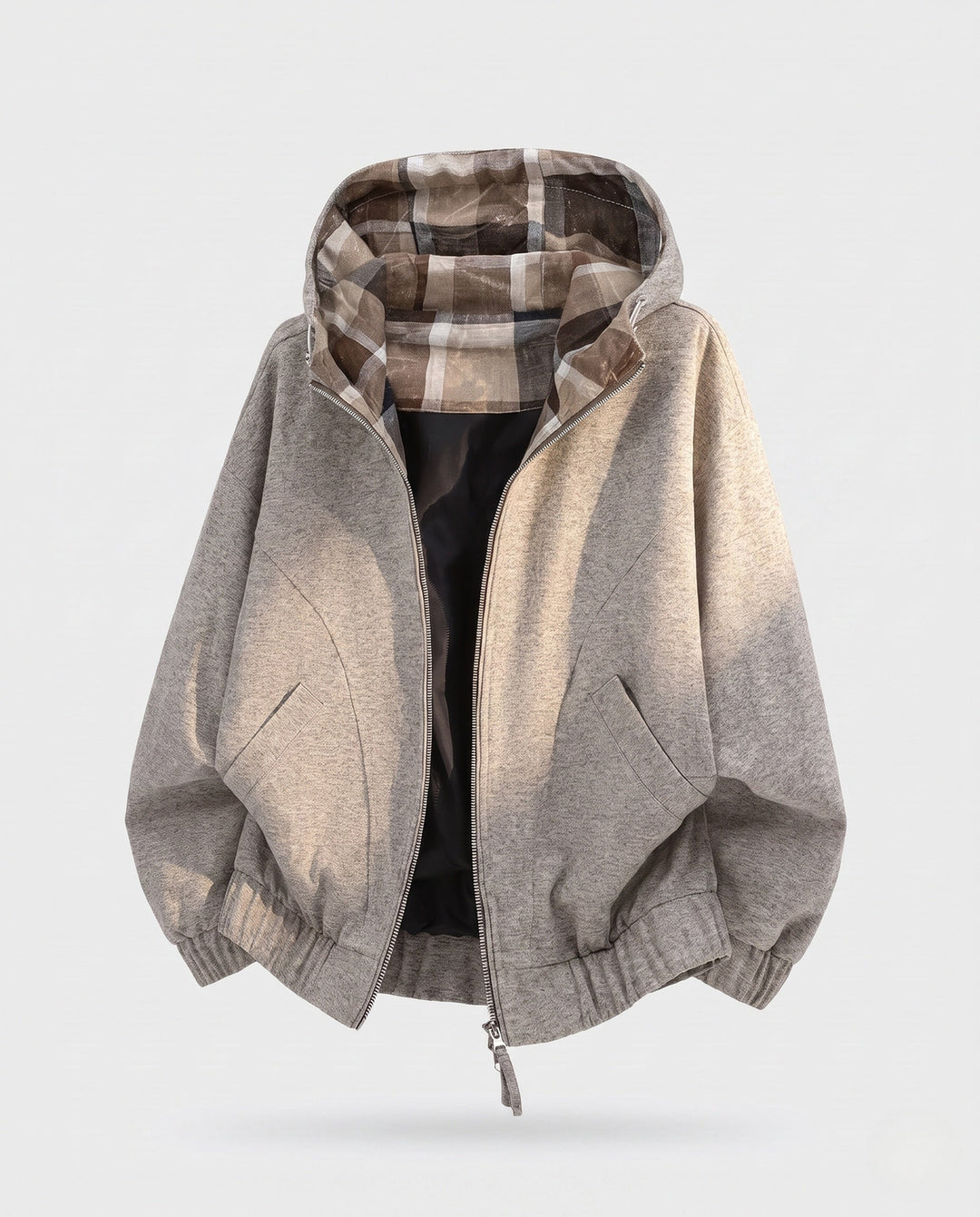 Women's oversized hoodie jacket with checked hood lining, elastic hem, and concealed side pockets