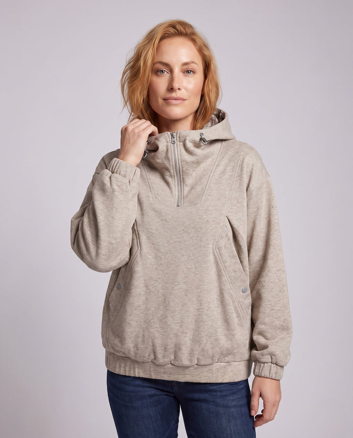 Women's oversized hoodie with half zipper, checkered lined hood, windproof inner layer, and patch snap-button pockets