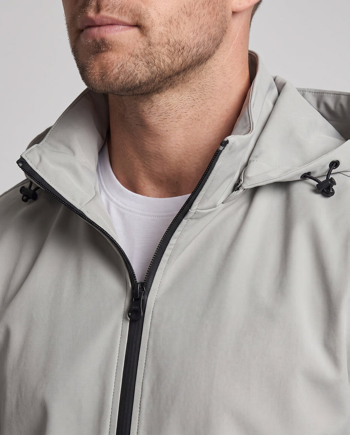 Men's breathable hooded softshell jacket with reflective arm stripes