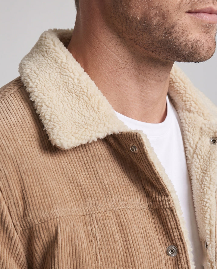 Men's cord workwear jacket with teddy fleece lining and chest zipper