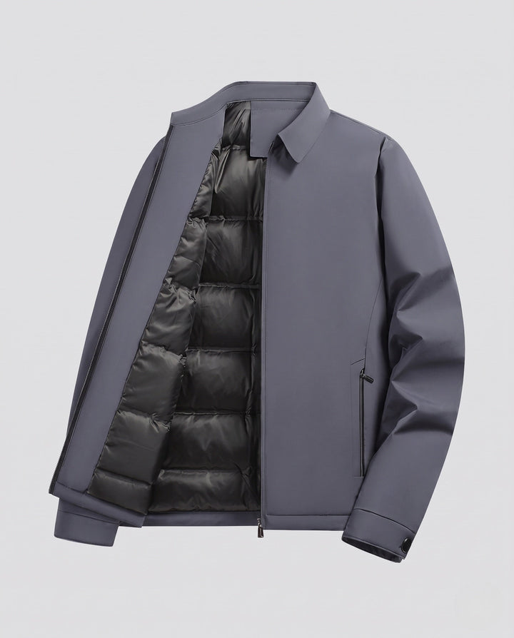 Men's quilted down jacket with minimalist outer shell and stand-up collar