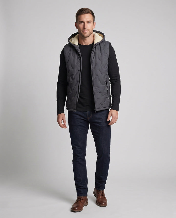 Men's quilted hooded vest with warming Sherpa lining and concealed zip pockets