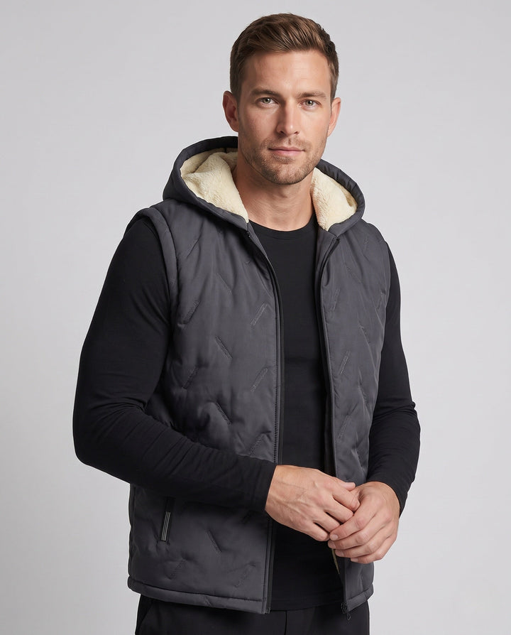 Men's quilted hooded vest with warming Sherpa lining and concealed zip pockets