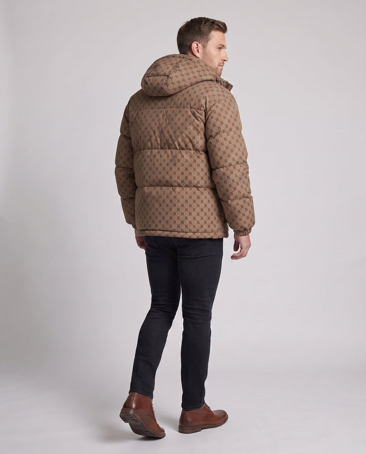Men's quilted oversized parka with hood, allover monogram, snap button placket, and large patch pockets