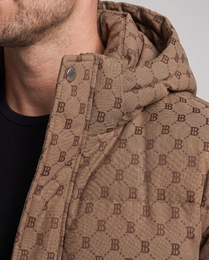Men's quilted oversized parka with hood, allover monogram, snap button placket, and large patch pockets