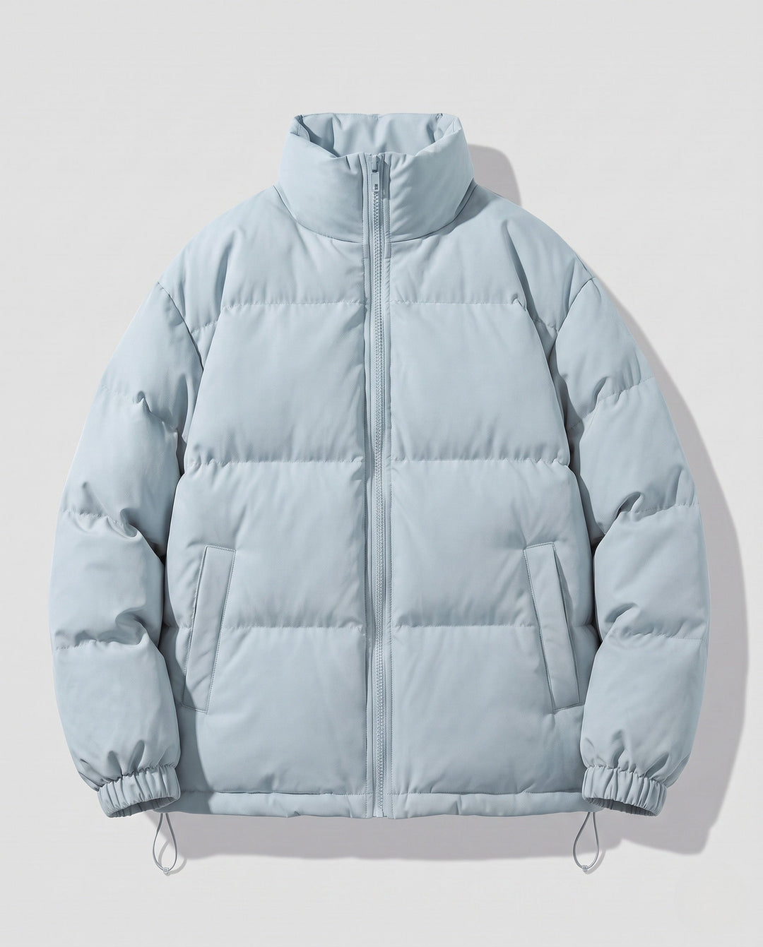 Men's short-cut quilted puffer with high stand-up collar and elastic cuffs