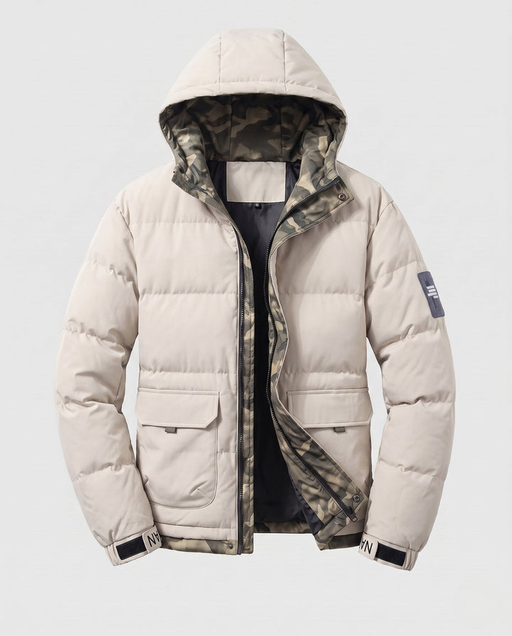 Men's short thermal quilted parka with hood, applied flap pockets, concealed front placket, and camouflage-lined interior