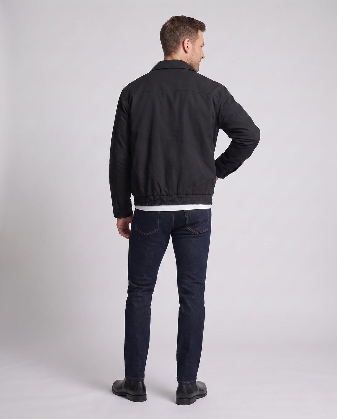 Men's casual field jacket with chest flap pockets, elastic hem, and zipper