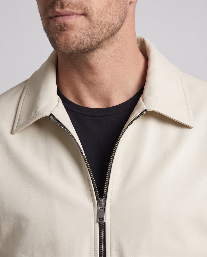Men's casual boxy faux leather jacket with shirt collar, flap pockets, and two-way zipper