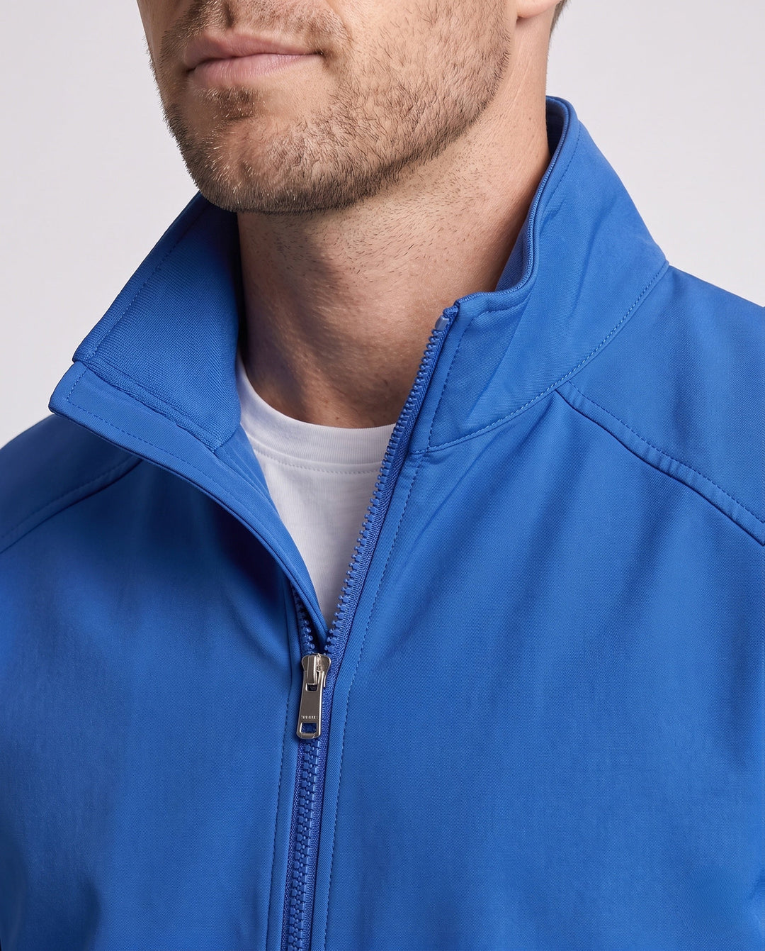 Men's lightweight urban blouson with standing collar, elastic hem, and sleeve pocket