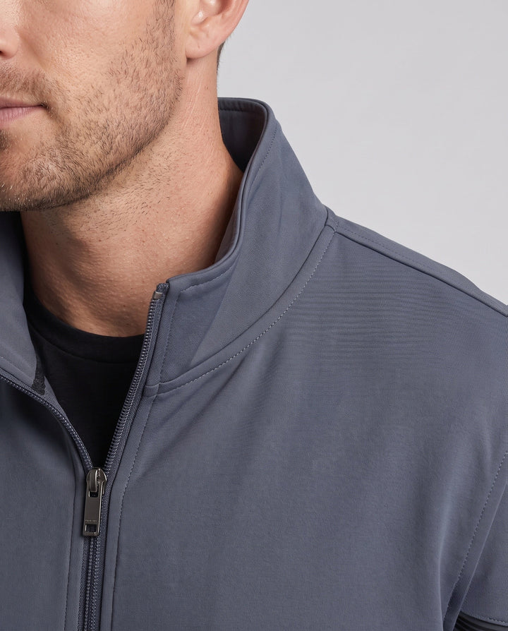 Men's lightweight zip training jacket with stand-up collar, ribbed cuffs and reflective sleeve stripes