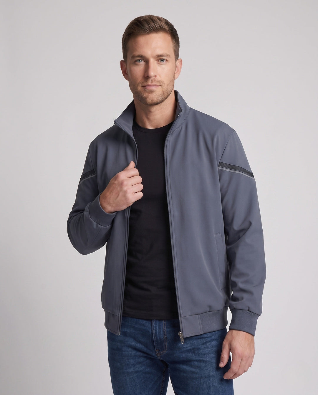 Men's lightweight zip training jacket with stand-up collar, ribbed cuffs and reflective sleeve stripes