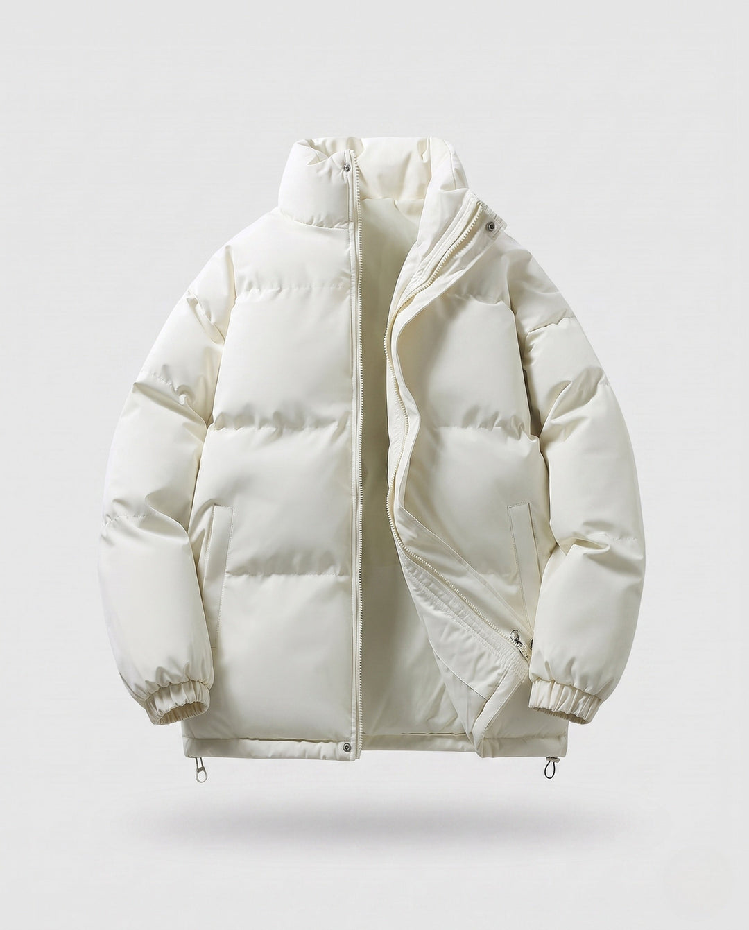 Men's minimalist thermal puffer jacket with high stand-up collar, internal wind protection, and elastic hem
