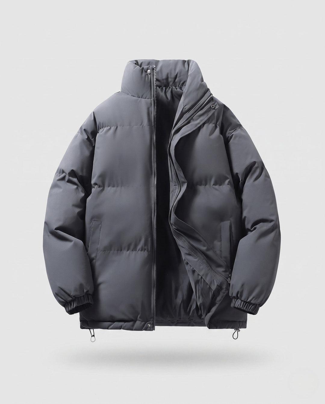 Men's minimalist thermal puffer jacket with high stand-up collar, internal wind protection, and elastic hem