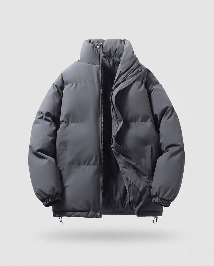 Men's minimalist thermal puffer jacket with high stand-up collar, internal wind protection, and elastic hem