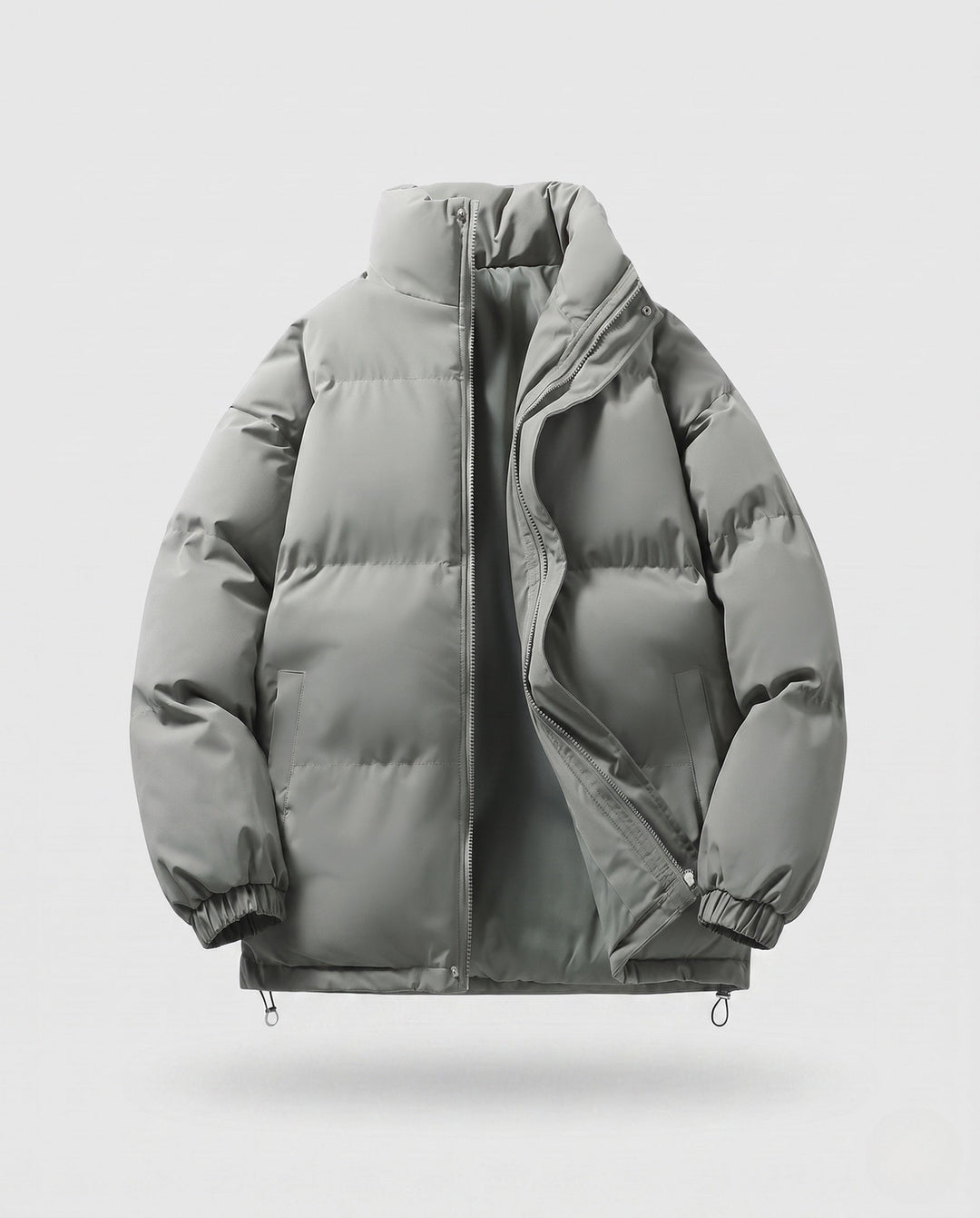 Men's minimalist thermal puffer jacket with high stand-up collar, internal wind protection, and elastic hem