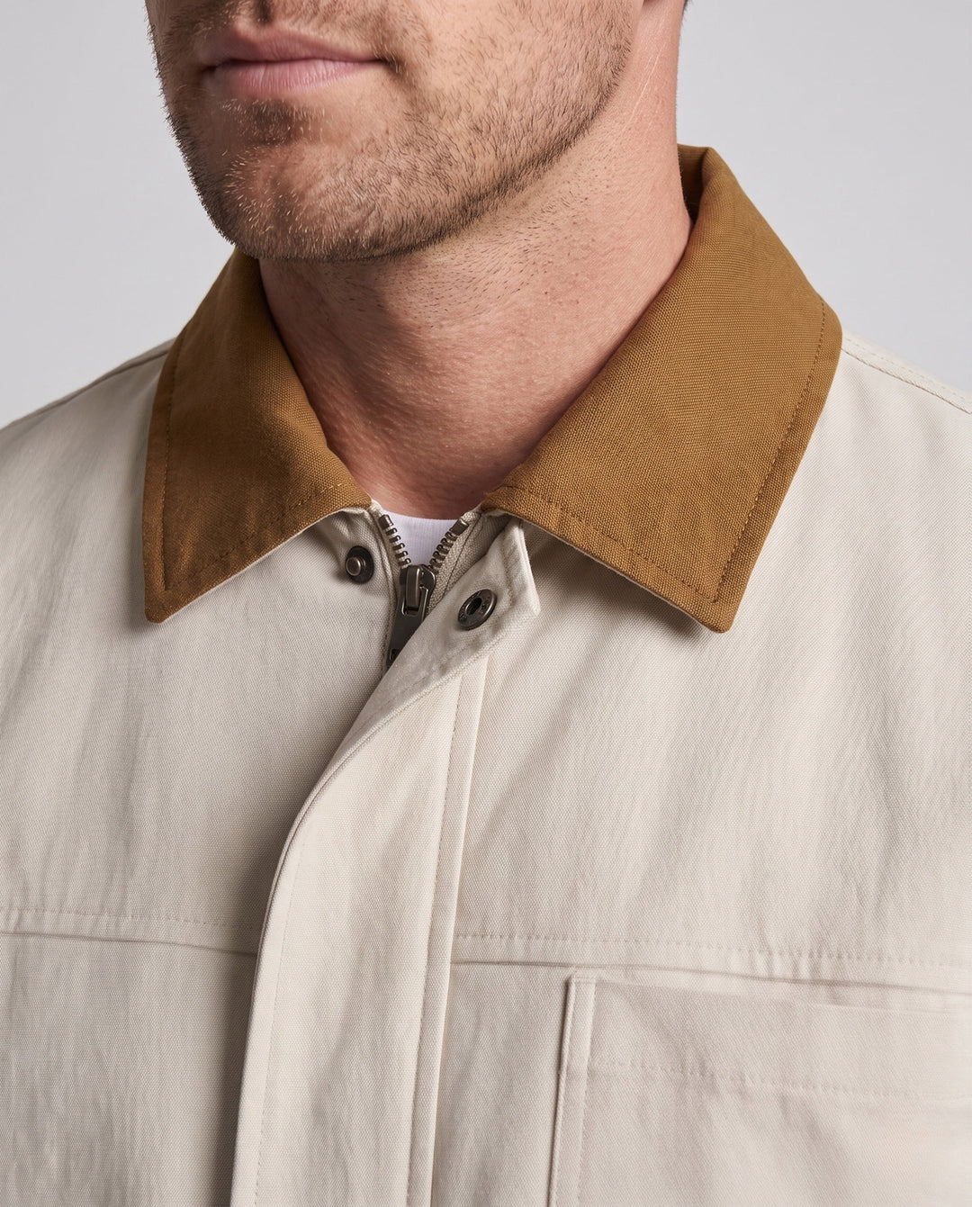 Men's oversized Harrington jacket with full zip, patch chest pocket, and elastic hem
