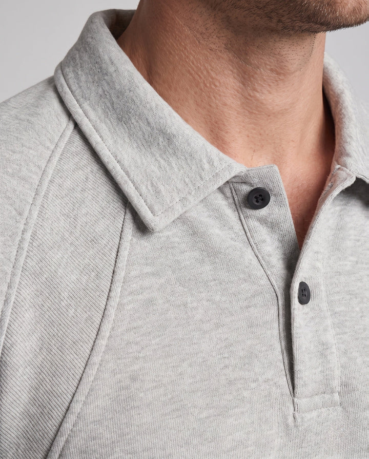 Men's oversized polo sweatshirt with raglan sleeves, shirt collar, and rounded hem