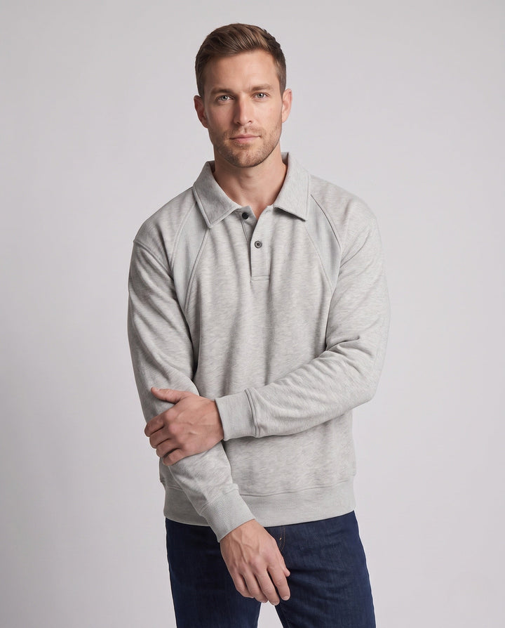 Men's oversized polo sweatshirt with raglan sleeves, shirt collar, and rounded hem